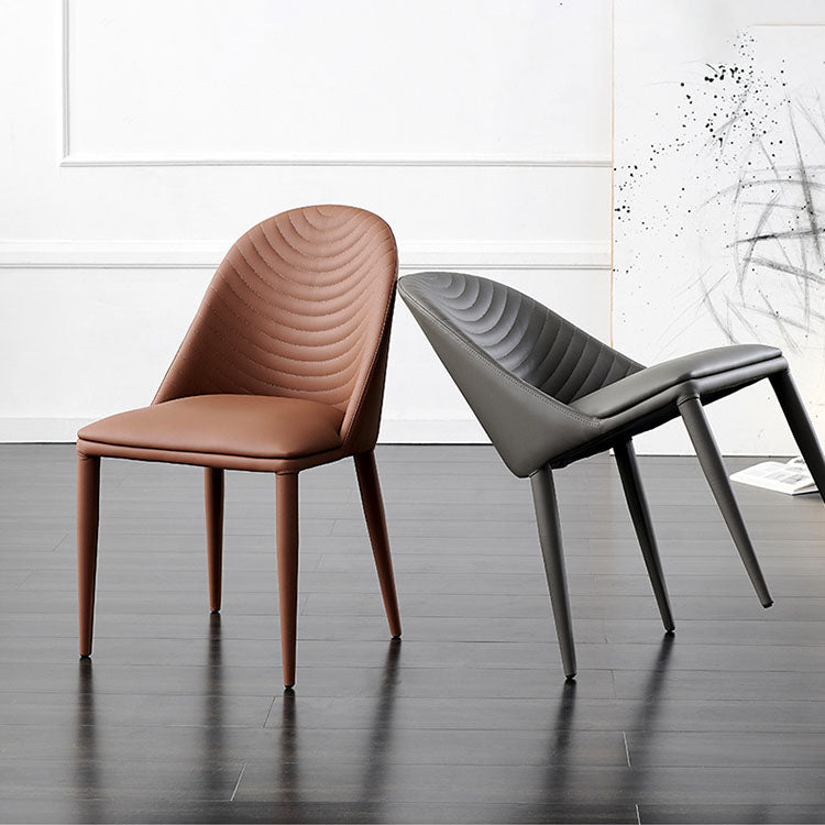 Silla sin brazos curvada de cuero moderna con acabado mate Parsons