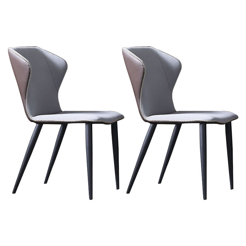 Silla lateral de cuero contemporánea para restaurante Sillas de comedor con respaldo orejero