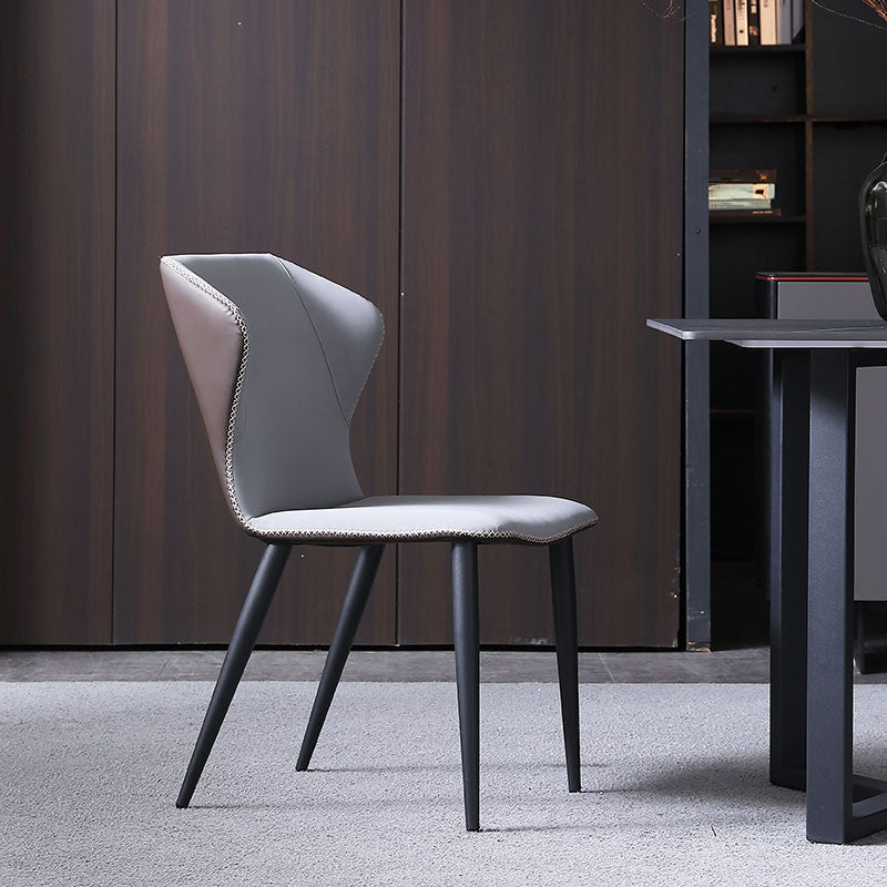 Silla lateral de cuero contemporánea para restaurante Sillas de comedor con respaldo orejero