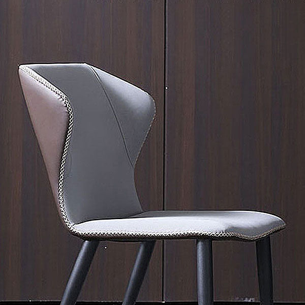 Silla lateral de cuero contemporánea para restaurante Sillas de comedor con respaldo orejero