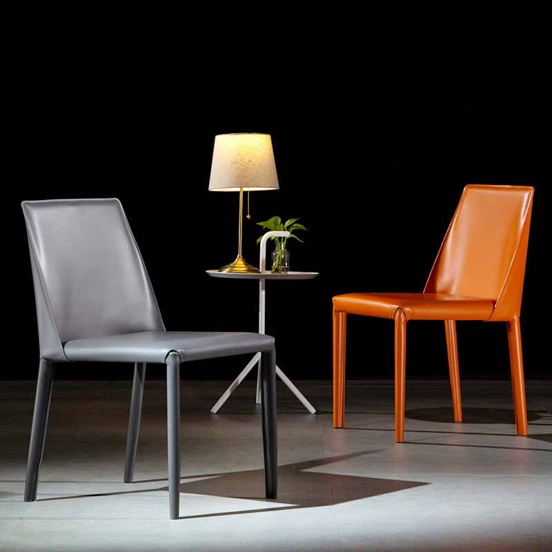 Silla de comedor de cuero de silla de montar con respaldo sólido de restaurante estilo diseñador