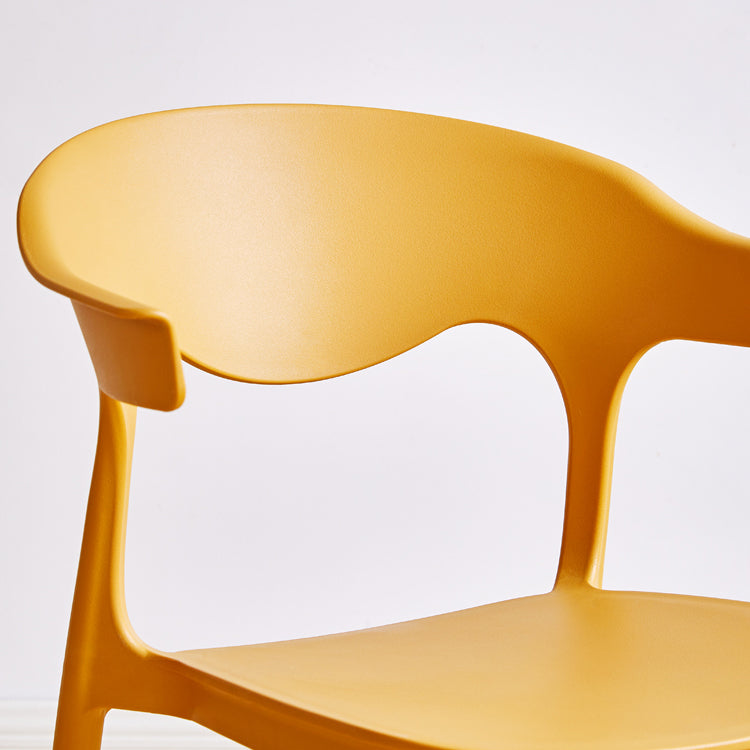 El plástico contemporáneo que cena la parte posterior abierta apilable de las sillas sin brazos cena la silla lateral