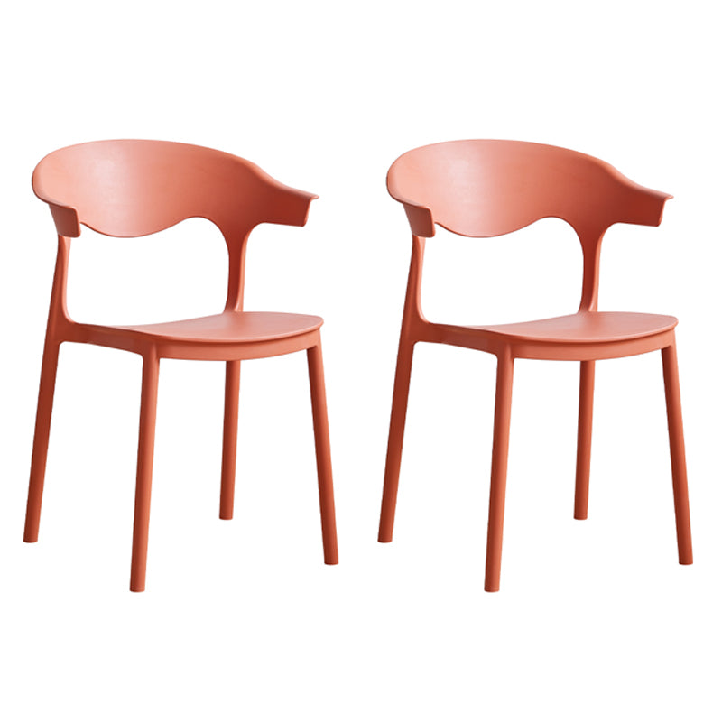 El plástico contemporáneo que cena la parte posterior abierta apilable de las sillas sin brazos cena la silla lateral