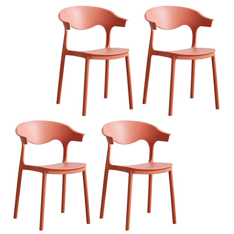 El plástico contemporáneo que cena la parte posterior abierta apilable de las sillas sin brazos cena la silla lateral