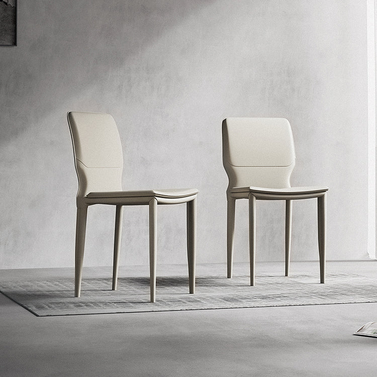 Sillas laterales contemporáneas sin brazos con respaldo sólido Sillas de comedor de cuero