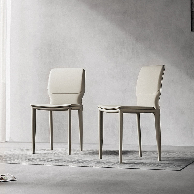 Sillas laterales contemporáneas sin brazos con respaldo sólido Sillas de comedor de cuero