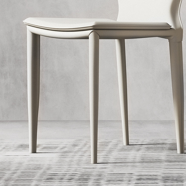 Sillas laterales contemporáneas sin brazos con respaldo sólido Sillas de comedor de cuero