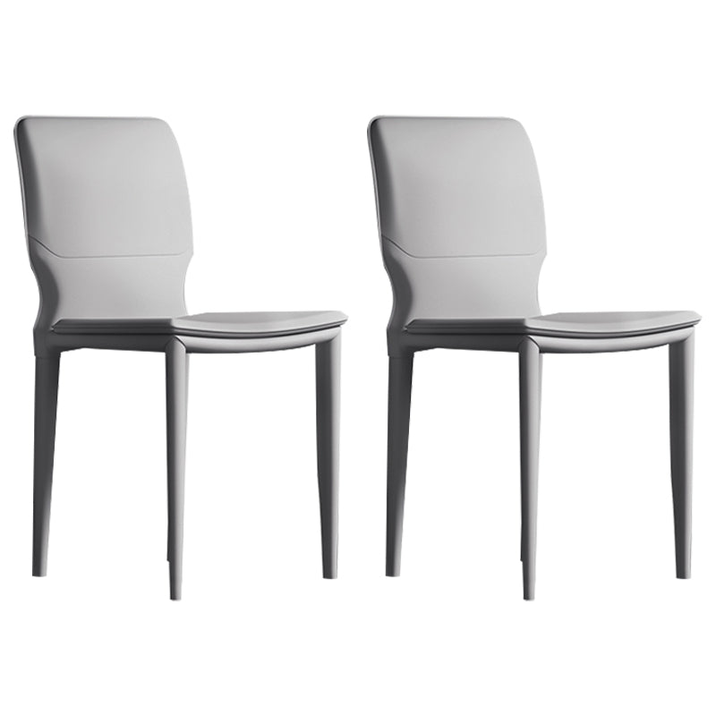 Sillas laterales contemporáneas sin brazos con respaldo sólido Sillas de comedor de cuero