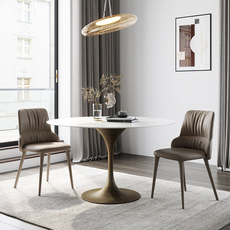 Dinettetafel in eigentijdse stijl, rond stenen meubilair met tulponderstel