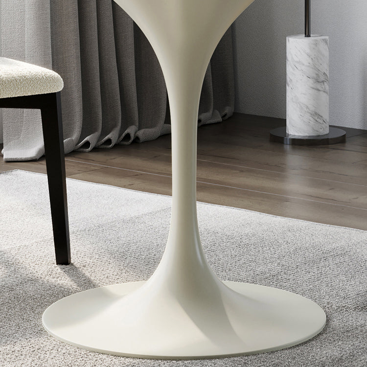 Dinettetafel in eigentijdse stijl, rond stenen meubilair met tulponderstel