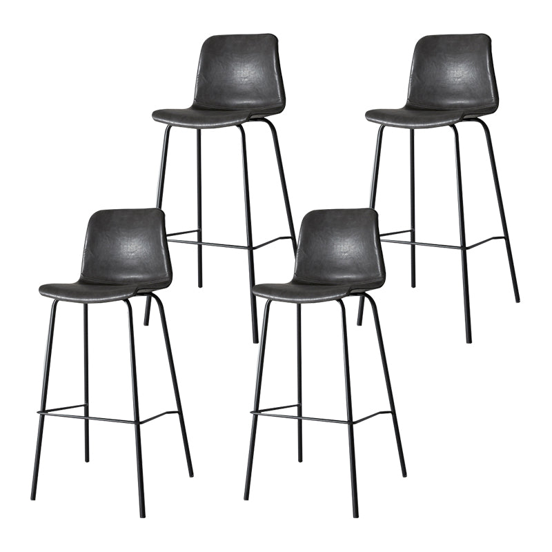 Taburete de bar de cuero interior moderno con reposapiés y respaldo bajo