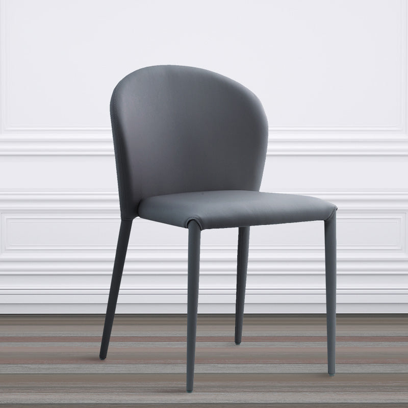 Minimalistische stijl armloze vaste achterzijde stoelen lederen eetkamerstoelen voor thuis