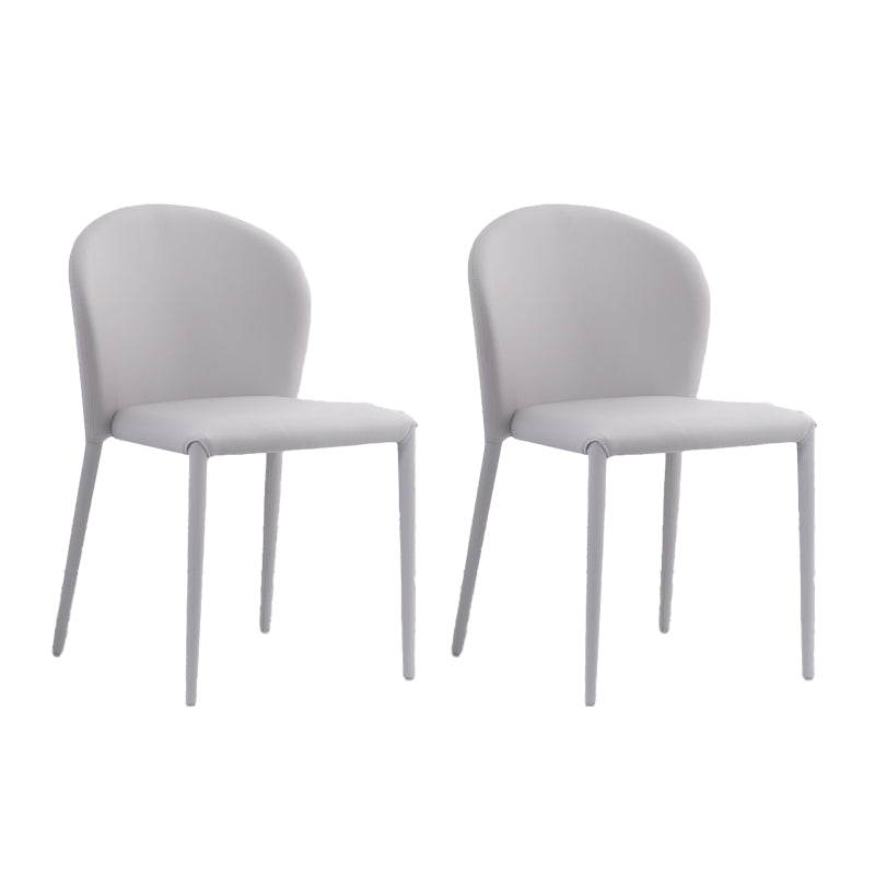 Minimalistische stijl armloze vaste achterzijde stoelen lederen eetkamerstoelen voor thuis