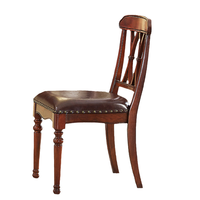 Silla lateral de cuero tradicional para restaurante Silla de comedor con respaldo cruzado natural