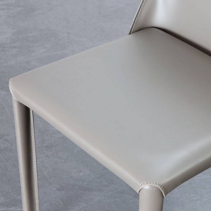 Minimalistische lederen eetstoelen stoelen stevige rugarmloze eetkamerstoelen voor keuken