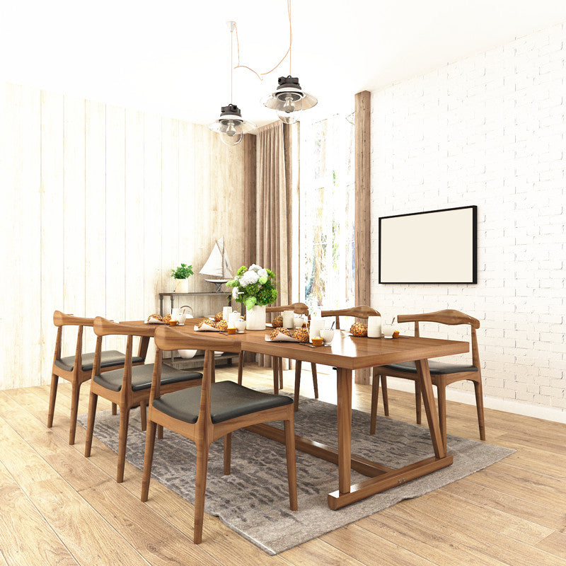 Mesa de comedor de madera maciza contemporánea con base de caballete