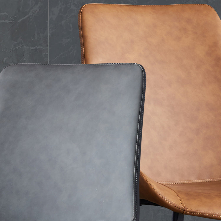 Silla lateral de cuero contemporánea para restaurante Silla de comedor con respaldo sólido