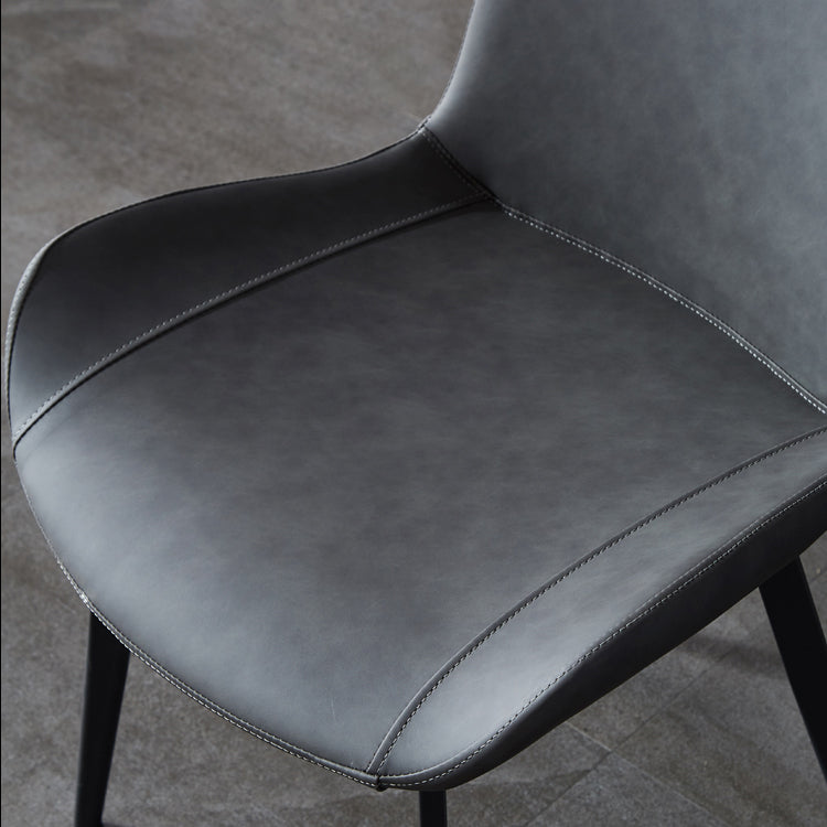 Silla lateral de cuero contemporánea para restaurante Silla de comedor con respaldo sólido