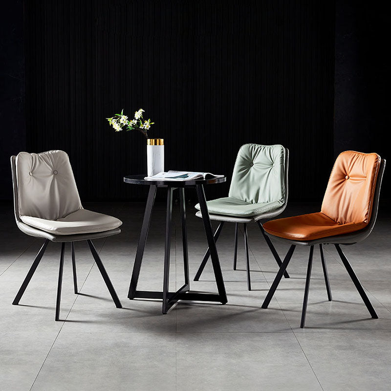 Sillas laterales con respaldo sólido sin brazos de diseño minimalista Sillas de comedor de cuero
