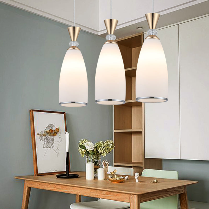 Salle à manger suspendue pendante de style moderne avec une teinte en verre blanc