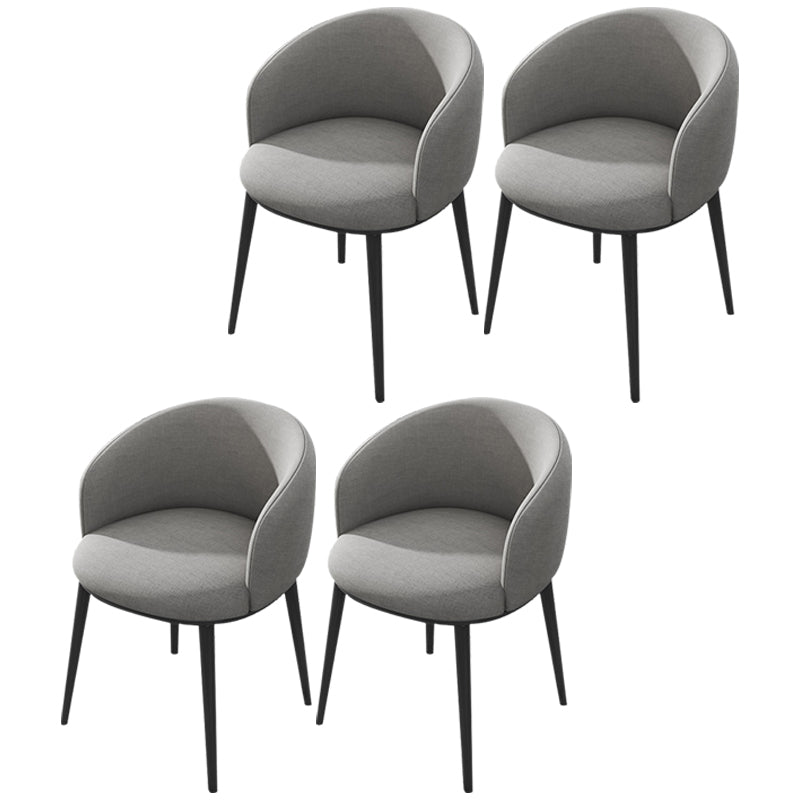 Silla de comedor tapizada moderna con respaldo sólido y acabado mate