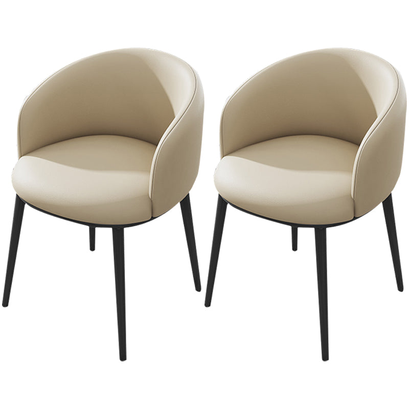 Silla de comedor tapizada moderna con respaldo sólido y acabado mate