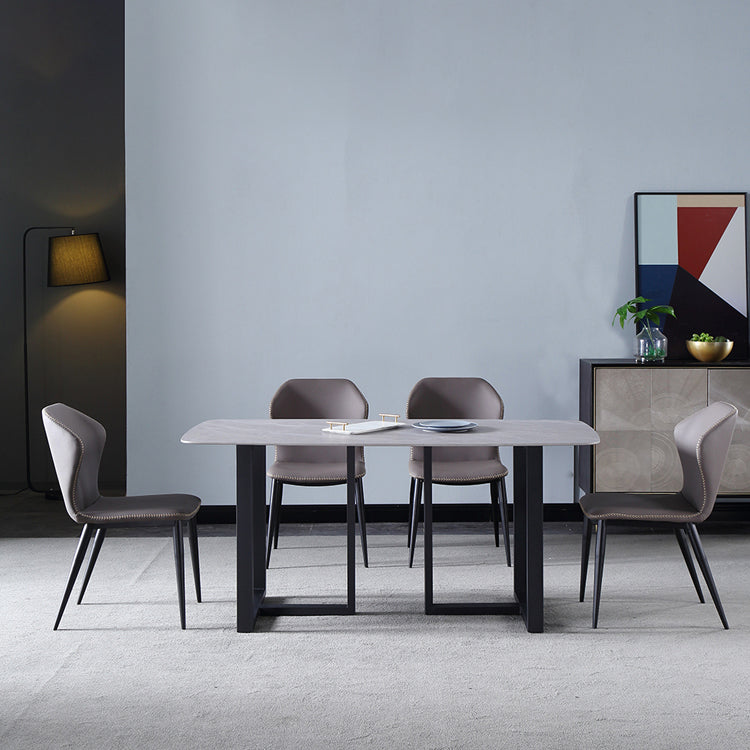El lado sin brazos del diseño contemporáneo preside el cuero que cena la silla lateral