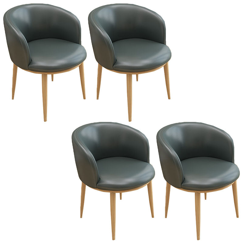 Silla de comedor de cuero con respaldo sólido y acabado mate para el hogar contemporáneo