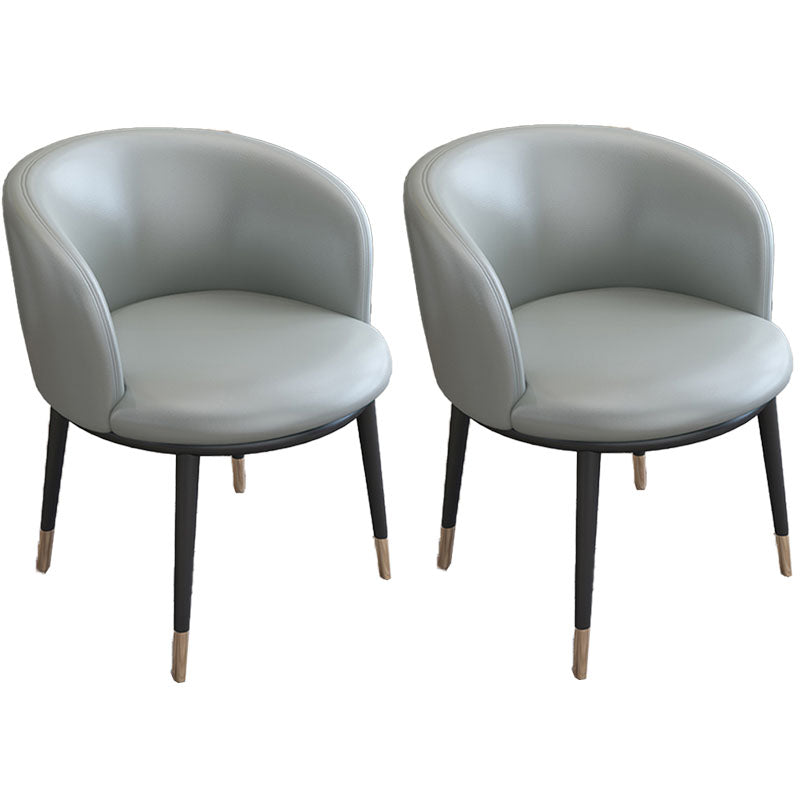 Silla de comedor de cuero con respaldo sólido y acabado mate para el hogar contemporáneo
