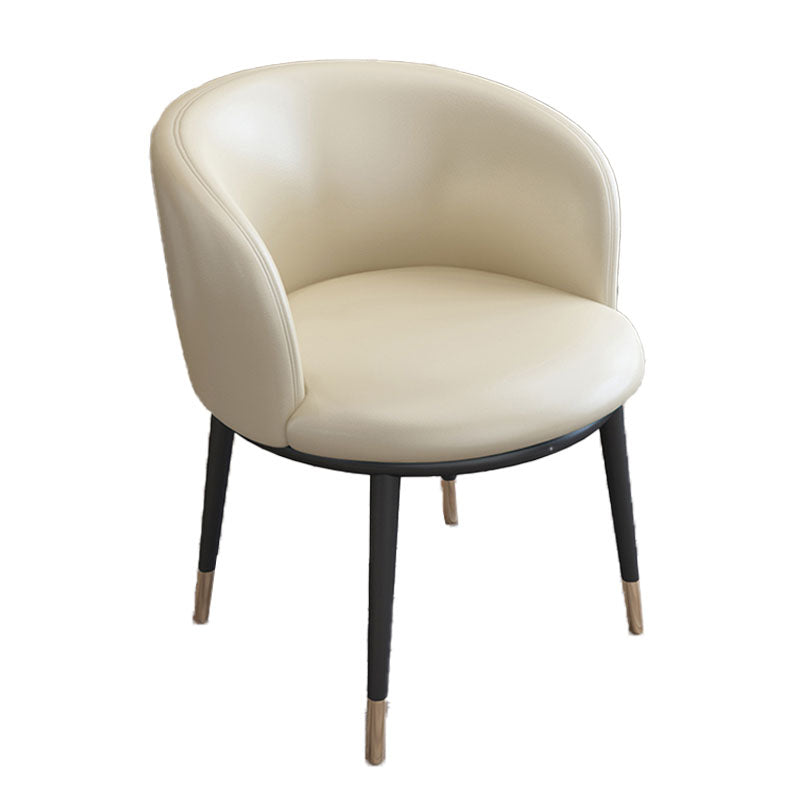 Silla de comedor de cuero con respaldo sólido y acabado mate para el hogar contemporáneo