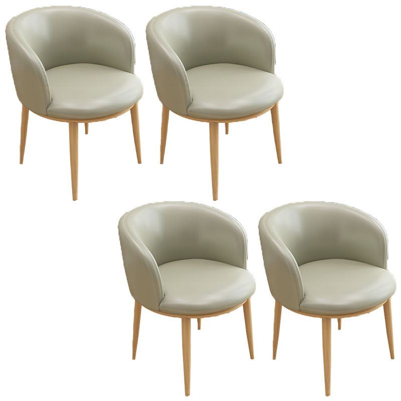Silla de comedor de cuero con respaldo sólido y acabado mate para el hogar contemporáneo