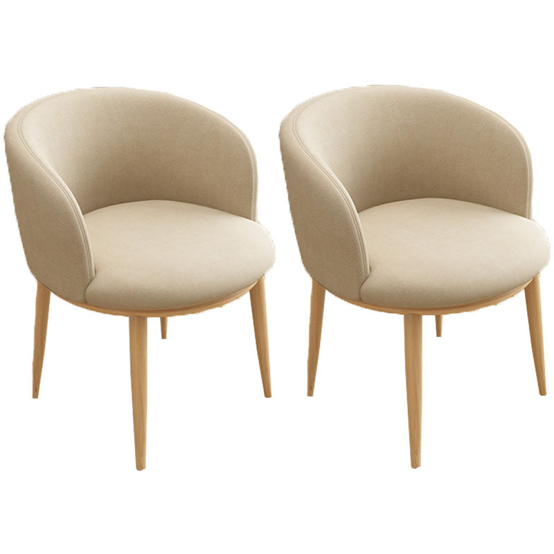 Silla de comedor de cuero con respaldo sólido y acabado mate para el hogar contemporáneo