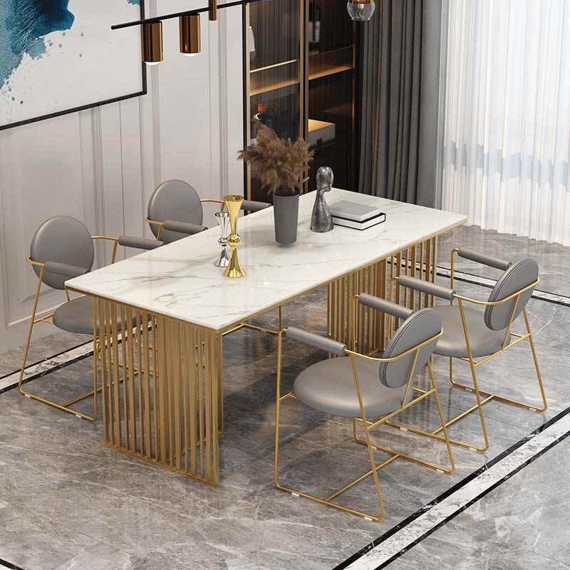 Mesa de comedor de lujo tradicional Mesa de piedra sinterizada con marco de oro para uso en el hogar