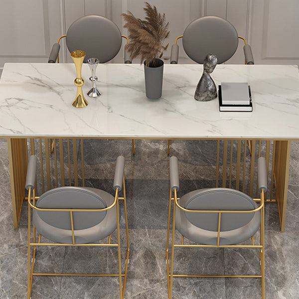 Mesa de comedor de lujo tradicional Mesa de piedra sinterizada con marco de oro para uso en el hogar