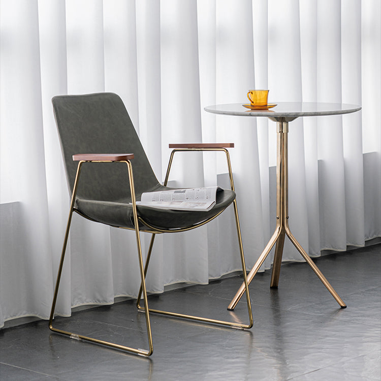 Silla auxiliar de comedor con respaldo sólido de diseño escandinavo Silla auxiliar de comedor de cuero