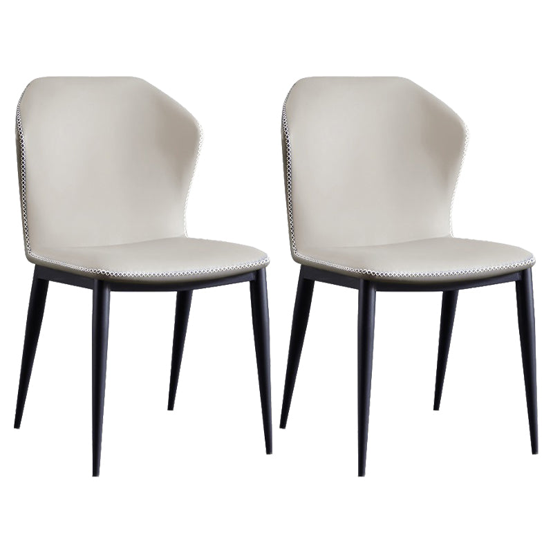 Chaise contemporaine sans accoudoirs, finition mate, chaise d'appoint incurvée en cuir à oreilles pour salle à manger