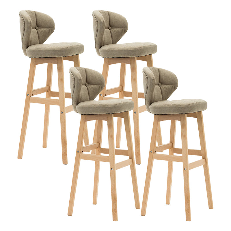 Taburete de bar de estilo escandinavo con respaldo bajo y patas de madera para restaurante y bar