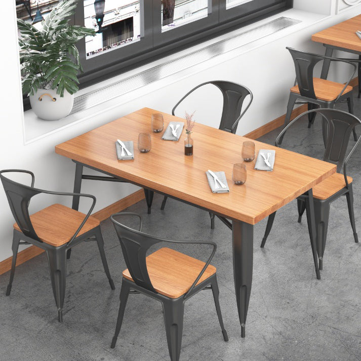 Mesa de comedor de madera sólida Mesa de comedor industrial de 4 patas con base de metal