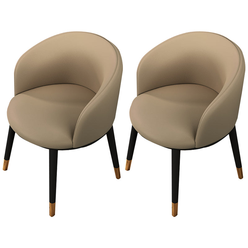 Silla de comedor tapizada moderna con respaldo sólido y acabado mate