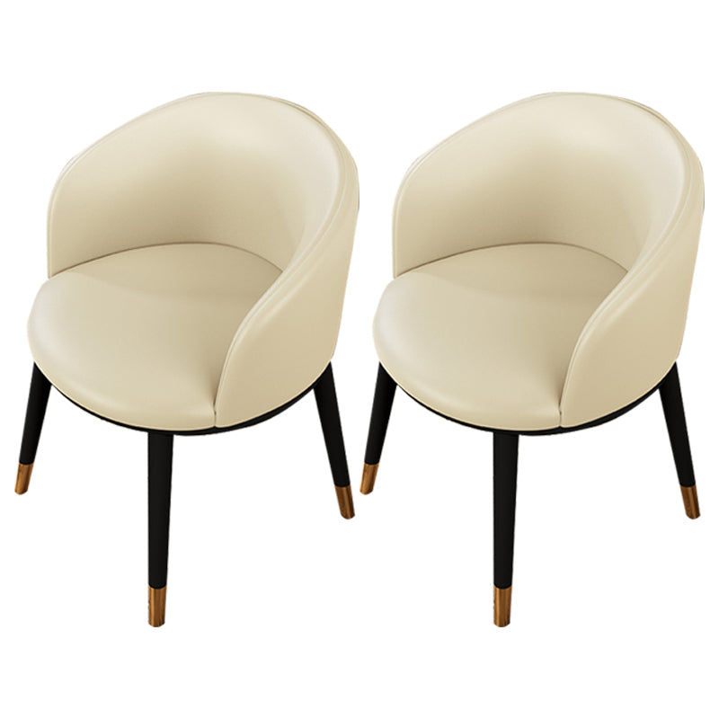Silla de comedor tapizada moderna con respaldo sólido y acabado mate