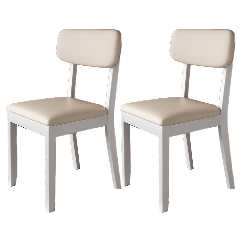 Silla auxiliar de comedor moderna, silla con respaldo abierto curvado de madera maciza y cuero con acabado mate