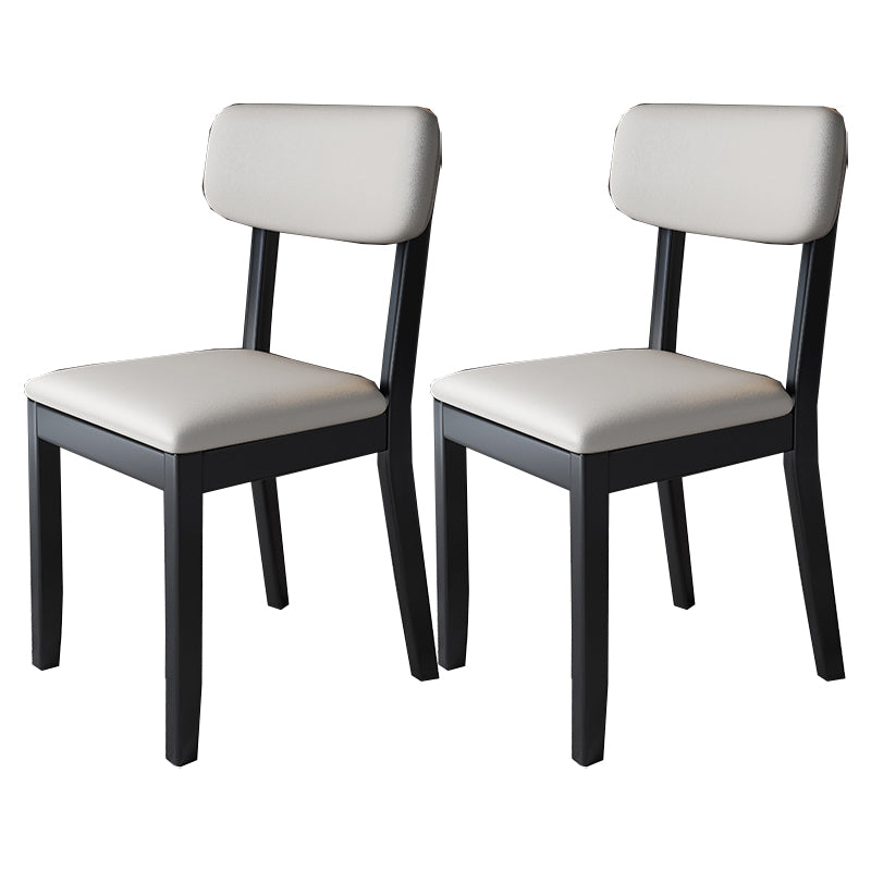 Silla auxiliar de comedor moderna, silla con respaldo abierto curvado de madera maciza y cuero con acabado mate