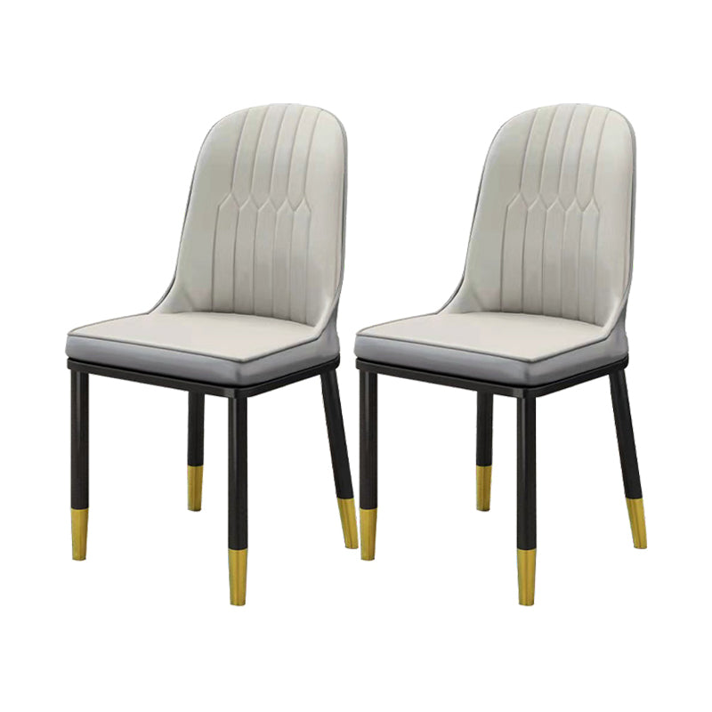 Silla de comedor sin brazos con respaldo sólido de comedor de cuero de PU de estilo escandinavo