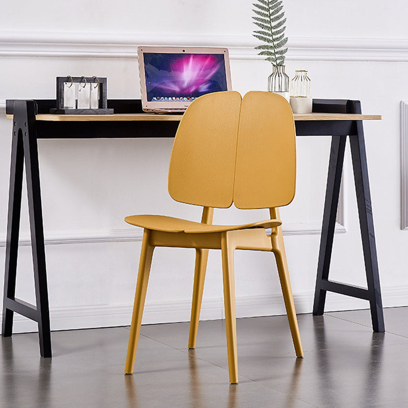 Sillas de comedor y decorativas contemporáneas Silla lateral de plástico con respaldo abierto para interiores y exteriores