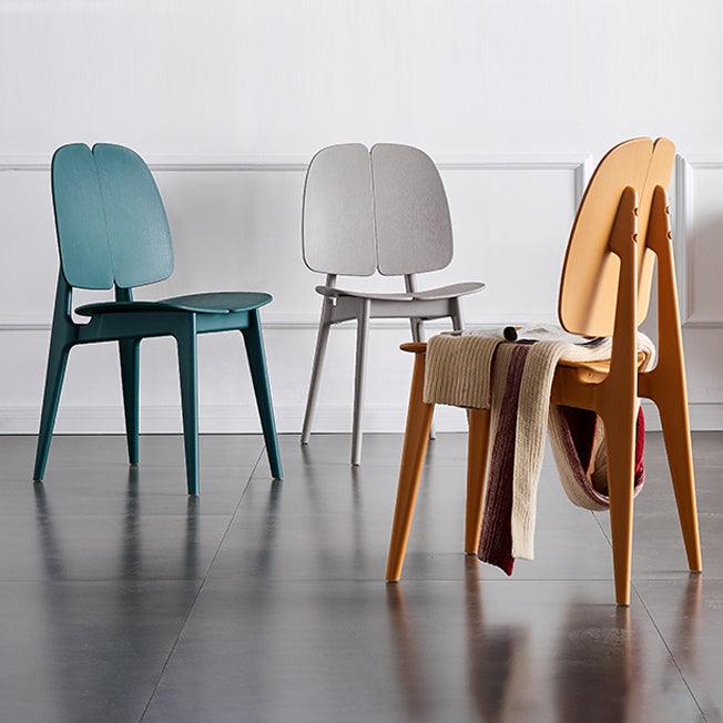 Sillas de comedor y decorativas contemporáneas Silla lateral de plástico con respaldo abierto para interiores y exteriores