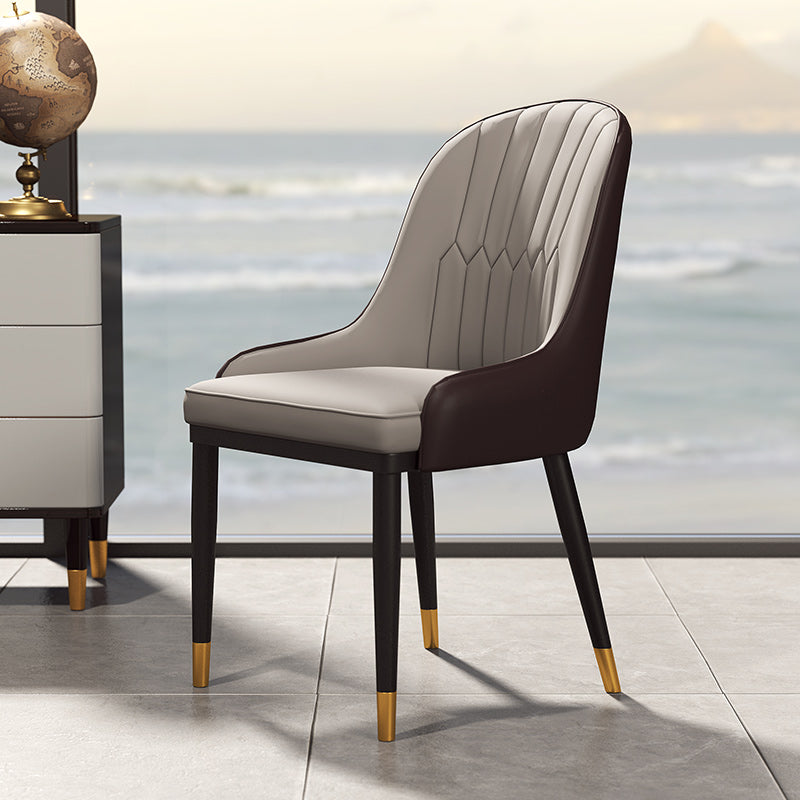 Silla auxiliar de comedor de cuero con respaldo sólido de diseño escandinavo