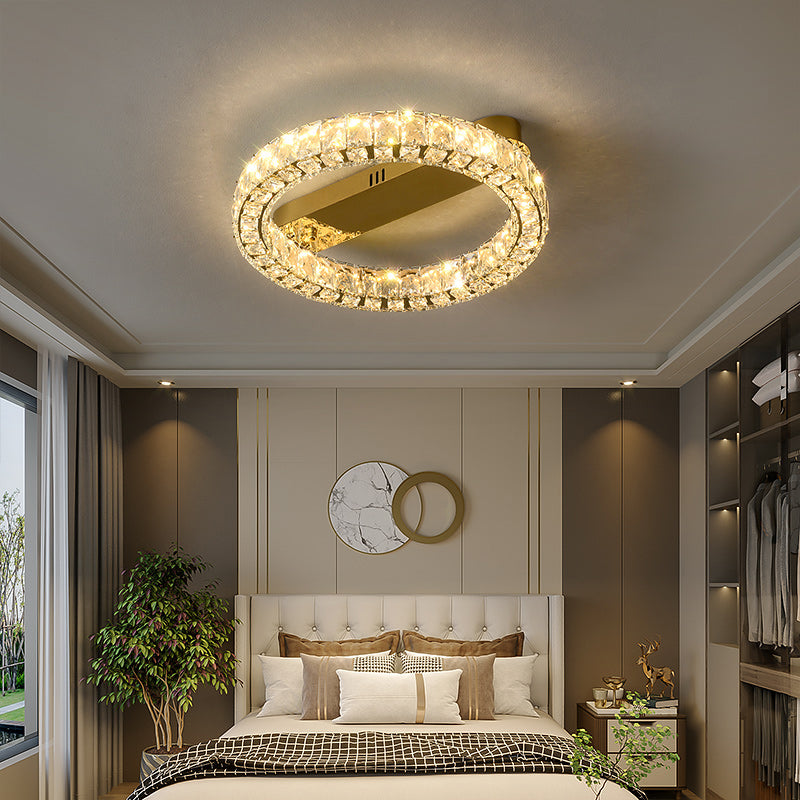 Moderne, runde Deckenleuchte aus Kristallglas in Gold für das Wohnzimmer