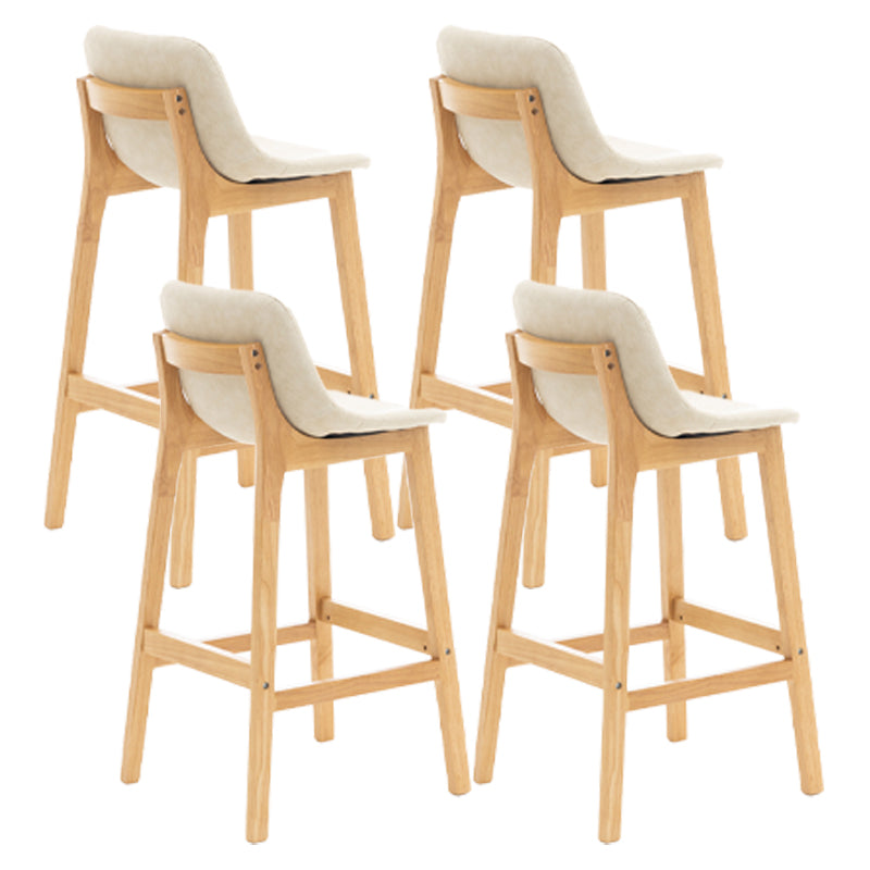 Taburete de bar de estilo escandinavo, asiento tipo cubo con patas de madera y respaldo bajo para barra de cocina