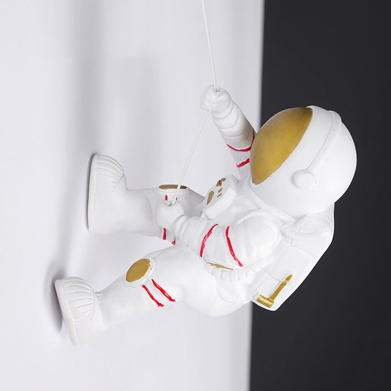 Lampada da parete astronauta e piante