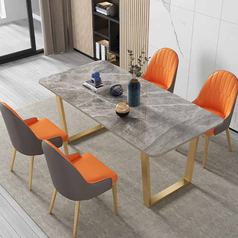 Mesa de cocina rectangular de lujo con superficie de piedra sinterizada y pedestal doble en dorado